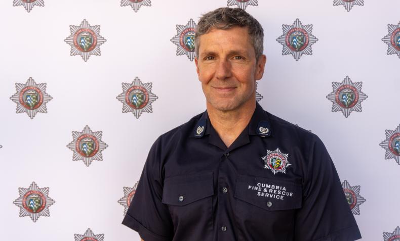 A portrait of a male firefighter